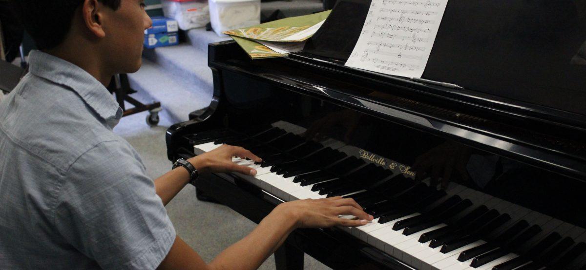 Sophomore Tak Maga chose the piano as his signature instrument. [Vivienne Tran]