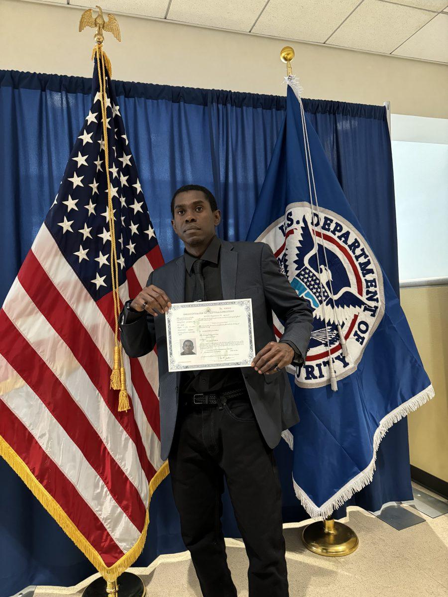 Janitor Junot gains citizenship 