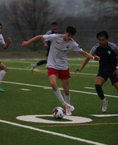 Courtesy of JBFILMZ

 Miles, playing for Napa United, dribbles past his opponent on the field.