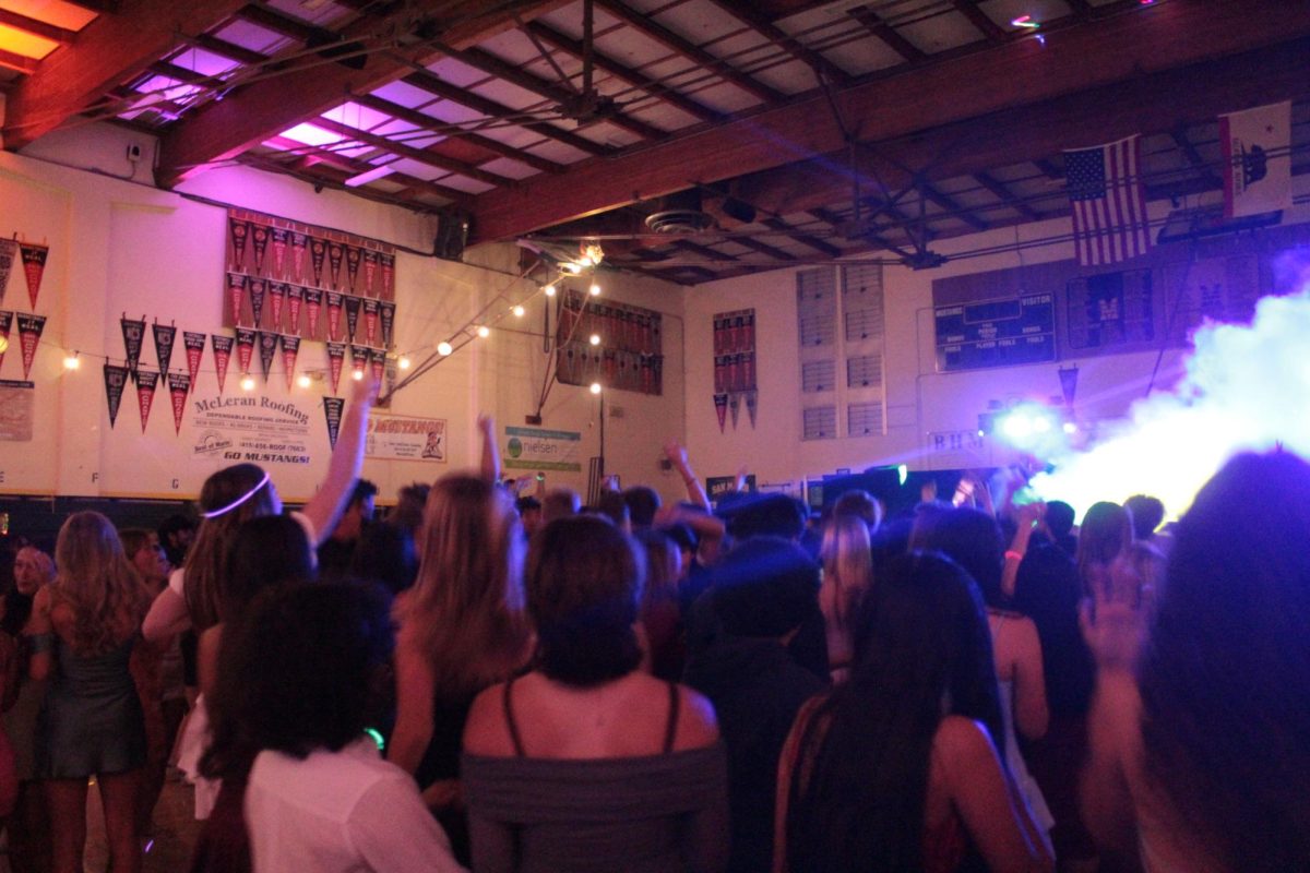 San Marin students jumping up and down to music in San Marin Gym. on Saturday, Sept. 27, 2025.