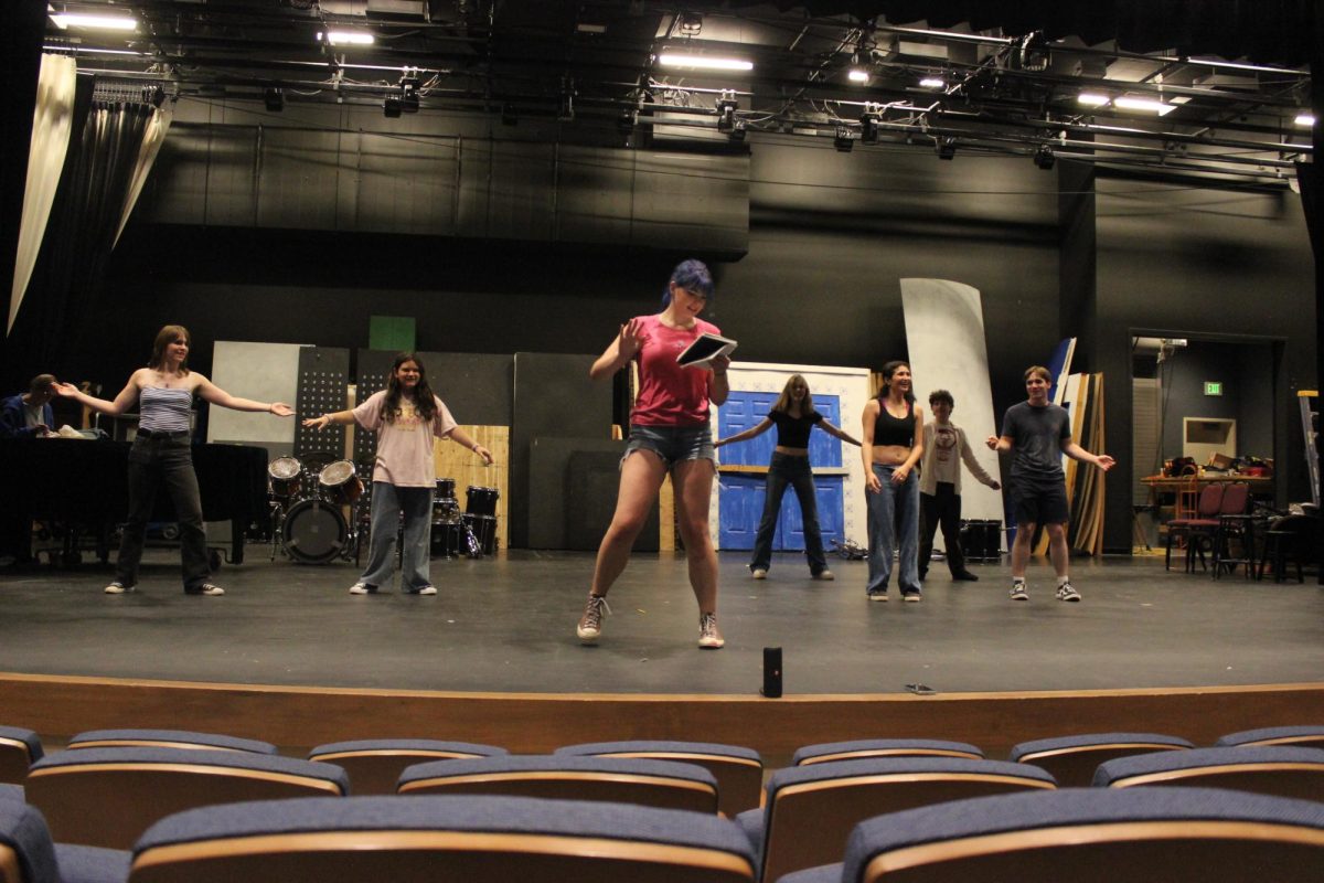 Brownfield teaches featured dancers (left to right) senior Kara
Schutz, junior Camila Cabrera, senior Riley Walsh, senior Story
Ng, senior Marc Thomatos, and senior Gabriel Schutz.