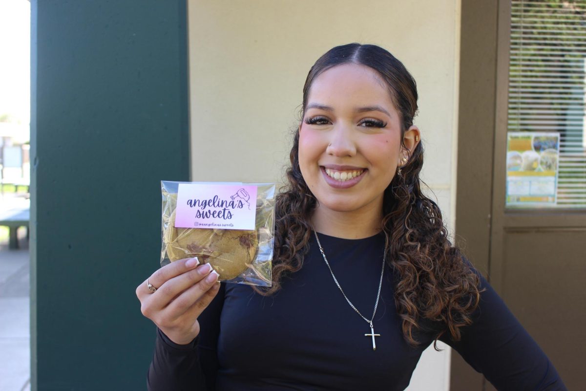 Angelina Alvarez holds a dessert from her business Angelina’s Sweets. Alvarez has been running her company since January 2025.