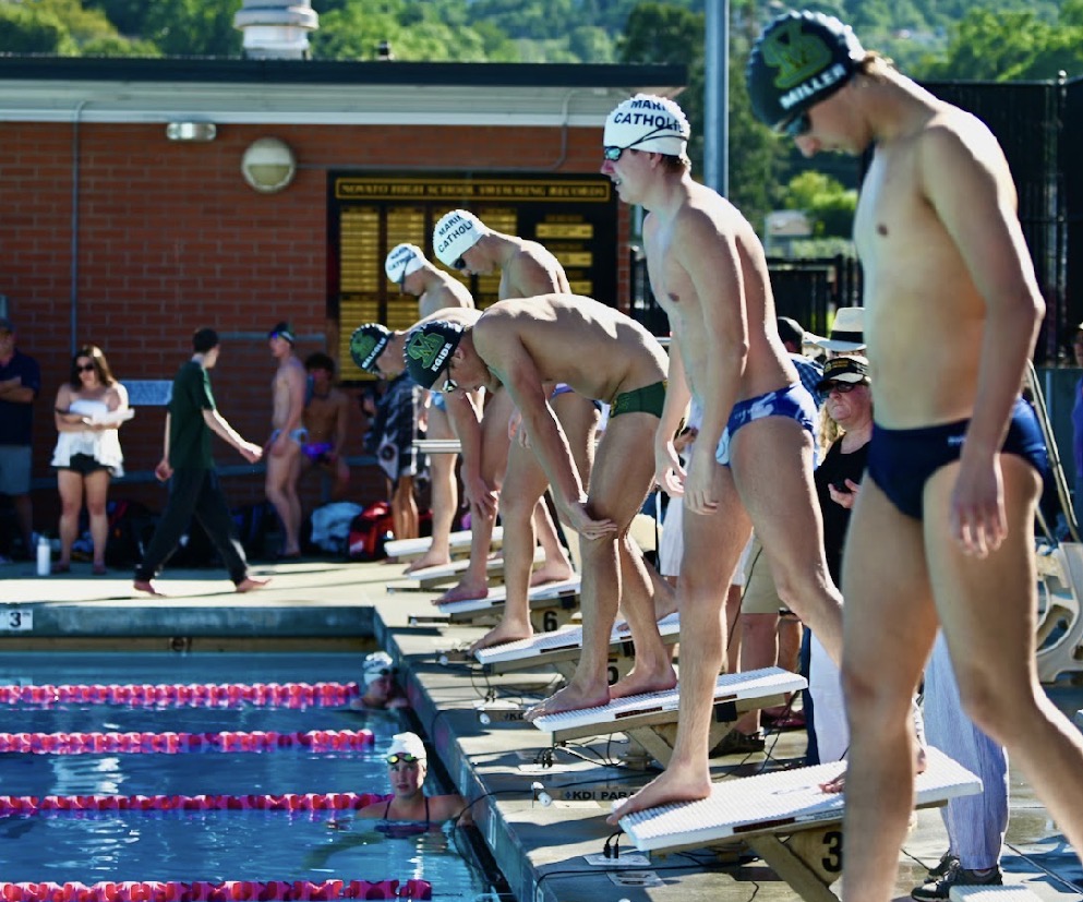 San Marin boys get ready to swim against the Marin Catholic
boys team at Novato High school.